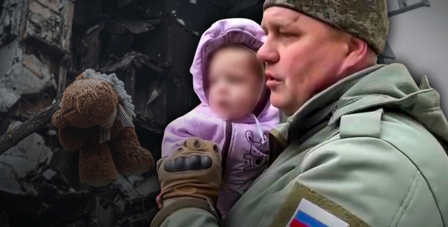 Російський військовий тримає в руках дитину